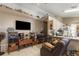 Spacious living room featuring neutral walls, display shelving, and an open floor plan at 4561 Heritage Oak Dr, Orlando, FL 32808