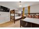 Bedroom with bunk beds, a double bed and TV at 4983 Windermere Ave, Kissimmee, FL 34746