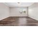 An airy bedroom featuring modern floors, natural light, and neutral walls, creating a serene and inviting space at 50 Community Dr, Debary, FL 32713
