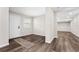 The welcoming entryway showcases modern floors and a bright, airy atmosphere, leading into the home's living spaces at 50 Community Dr, Debary, FL 32713