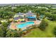 Stunning aerial view showcasing the community pool, hot tub, and clubhouse at 510 Rum Run # 33 510, Davenport, FL 33837