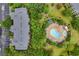 Overhead view of the complex with pool, jacuzzi, and landscaping at 510 Rum Run # 33 510, Davenport, FL 33837