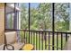 Relaxing balcony with chairs and scenic views of lush greenery at 510 Rum Run # 33 510, Davenport, FL 33837