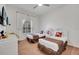 A bedroom featuring two twin beds, wicker drawers, and a ceiling fan, ideal for relaxation at 510 Rum Run # 33 510, Davenport, FL 33837