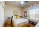 Bright bedroom featuring a comfortable bed, ample natural light, and a ceiling fan at 510 Rum Run # 33 510, Davenport, FL 33837