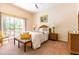 Inviting bedroom featuring neutral colors, a comfortable bed, and a view of the outdoors at 510 Rum Run # 33 510, Davenport, FL 33837