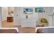 A bedroom featuring two twin beds, wicker drawers, two wall-mounted TVs, and a cheerful design at 510 Rum Run # 33 510, Davenport, FL 33837