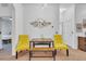 Interior dining room boasts modern decor, a stylish light fixture, and a bench dining table at 510 Rum Run # 33 510, Davenport, FL 33837