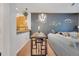 Dining area features a modern table set, stylish lighting, and easy access to the adjacent living room at 510 Rum Run # 33 510, Davenport, FL 33837