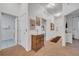 Hallway with wicker furnishings and access to the bathroom and bedroom, providing a clean and organized layout at 510 Rum Run # 33 510, Davenport, FL 33837
