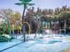 Fun splash pad with colorful water features and playful design for children at 510 Rum Run # 33 510, Davenport, FL 33837