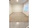 Carpeted bedroom with bright natural light, neutral paint, and modern window coverings at 5168 Greenheart Ave, Mount Dora, FL 32757