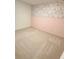 Bedroom with carpeted floors, two-toned walls, and floral wallpaper at 5168 Greenheart Ave, Mount Dora, FL 32757