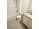 Clean bathroom featuring a granite vanity, tub, shower and tiled flooring at 5216 Greenheart Ave, Mount Dora, FL 32757