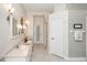 Bright main bathroom with double sinks, granite countertops, and updated lighting at 603 Yorkshire Dr, Oviedo, FL 32765