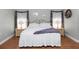 Spacious main bedroom featuring a comfortable king-sized bed with two bedside tables and lamps at 603 Yorkshire Dr, Oviedo, FL 32765