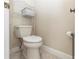 Toilet room featuring a standard toilet and white shelving for storage at 603 Yorkshire Dr, Oviedo, FL 32765