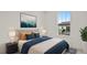 Cozy bedroom with stylish decor, comfortable bed, and bright window at 6678 Juneberry Way, Winter Garden, FL 34787
