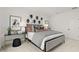 Primary bedroom with neutral paint, modern decor, plush carpet, and two bedside tables at 6678 Juneberry Way, Winter Garden, FL 34787