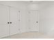 Modern bedroom with ample closet space and modern doors at 6678 Juneberry Way, Winter Garden, FL 34787