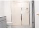 Bathroom featuring a shower with sliding glass doors at 707 Staffora St, Haines City, FL 33844