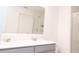 Clean bathroom boasts a single sink vanity, a mirror, and a glass-enclosed shower at 707 Staffora St, Haines City, FL 33844