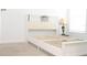 Bedroom featuring a white bed frame with a built-in headboard at 707 Staffora St, Haines City, FL 33844
