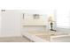 Bedroom featuring a white bed frame with a built-in headboard at 707 Staffora St, Haines City, FL 33844