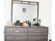 Close up of dresser with decor; adds a personal touch to the room at 707 Staffora St, Haines City, FL 33844