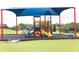 A vibrant playground with a slide and climbing structure, perfect for children to enjoy the outdoors at 707 Staffora St, Haines City, FL 33844