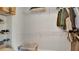 A well-organized closet featuring wire shelving and ample hanging space for clothes and storage at 726 Lake Biscayne Way, Orlando, FL 32824