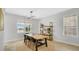 Bright dining room with stylish decor, a wooden table, and modern lighting at 726 Lake Biscayne Way, Orlando, FL 32824