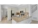 Bright kitchen boasting stainless appliances, granite countertops, and tile flooring at 726 Lake Biscayne Way, Orlando, FL 32824