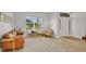 Inviting living room featuring tile flooring, natural light, and modern decor at 726 Lake Biscayne Way, Orlando, FL 32824