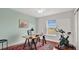Cozy office space with natural light, a desk, chair, exercise bike, and decor creating a productive atmosphere at 726 Lake Biscayne Way, Orlando, FL 32824