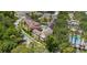 Aerial view of the community showcasing a short walk to the pool and surrounding lush landscaping at 754 Centervale Dr, Kissimmee, FL 34747