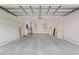 Spacious garage with shelving and plenty of room for storage and two cars at 754 Centervale Dr, Kissimmee, FL 34747