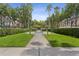 Beautiful green space area with walkways and lush landscaping at 754 Centervale Dr, Kissimmee, FL 34747
