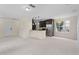 Open-concept kitchen with stainless steel appliances and tile flooring at 754 Centervale Dr, Kissimmee, FL 34747