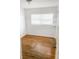 Bedroom features hardwood flooring, a window for natural light, and a closet at 766 Canovia Ave, Orlando, FL 32804