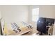 Comfortable bedroom with a large window and desk, perfect for studying or work at 853 Bocavista Ct, Davenport, FL 33896