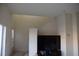 Bright living area with view of staircase and a wall-mounted television at 8564 Bay Lilly Loop, Kissimmee, FL 34747