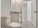 The bathroom boasts a toilet, tile floor, and granite countertop at 894 Pebble Crest Ln, Eagle Lake, FL 33839