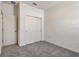 Bright bedroom with closet and plush carpeting at 894 Pebble Crest Ln, Eagle Lake, FL 33839