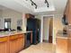 This functional kitchen offers an open design, granite counters, and modern appliances at 909 Royalton Rd, Orlando, FL 32825