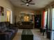 Comfortable living room with tile flooring, modern furnishings, and plenty of natural light at 909 Royalton Rd, Orlando, FL 32825