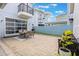 Backyard featuring a paved patio and furniture for entertaining at 9443 Merrifield St, Orlando, FL 32827