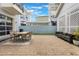 Backyard featuring a paved patio and furniture for entertaining at 9443 Merrifield St, Orlando, FL 32827