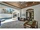 Covered patio area featuring tile floors, outdoor dining, a ceiling fan, and access to the pool at 9743 Covent Garden Dr, Orlando, FL 32827