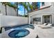 Inviting pool and spa area with integrated outdoor kitchen and lounge space for relaxation at 9743 Covent Garden Dr, Orlando, FL 32827